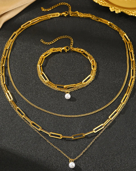 Parure dorée perle